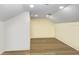 Large bonus room with light walls and hardwood floors at 16220 Villarreal De Avila, Tampa, FL 33613