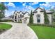Stunning curb appeal, two-story home with a porte-cochère at 16220 Villarreal De Avila, Tampa, FL 33613