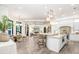 Spacious kitchen with white cabinets, large island, and breakfast nook at 16220 Villarreal De Avila, Tampa, FL 33613