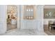 Modern kitchen with white cabinets and a large island at 16220 Villarreal De Avila, Tampa, FL 33613