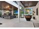 Outdoor kitchen with bar seating and high-end appliances at 16220 Villarreal De Avila, Tampa, FL 33613
