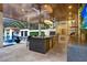 Spacious outdoor kitchen with bar, grill, and beverage center at 16220 Villarreal De Avila, Tampa, FL 33613