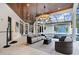Covered patio with seating area and pool view at 16220 Villarreal De Avila, Tampa, FL 33613