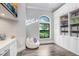 Bright playroom with built-in shelving and a comfortable beanbag chair at 16220 Villarreal De Avila, Tampa, FL 33613
