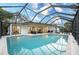 Large screened-in pool with plenty of space for relaxation and entertaining at 180 Water Oak Way, Oldsmar, FL 34677