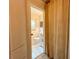 Bathroom with toilet, sink, and shower at 1825 San Mateo Dr, Dunedin, FL 34698