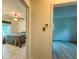 Bright hallway with doors to bedrooms and good natural light at 1825 San Mateo Dr, Dunedin, FL 34698