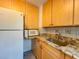 Kitchen corner with granite countertop and a microwave at 1825 San Mateo Dr, Dunedin, FL 34698