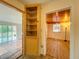 View into kitchen and adjacent dining area at 1825 San Mateo Dr, Dunedin, FL 34698