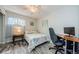Cozy bedroom with built-in workspace and large window at 1855 Bough Ave # B, Clearwater, FL 33760