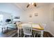 Charming dining area with white table and chairs at 1855 Bough Ave # B, Clearwater, FL 33760