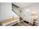 Entryway with staircase and decorative console table at 1855 Bough Ave # B, Clearwater, FL 33760