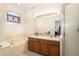Bathroom with double vanity, soaking tub, and shower at 2135 Park Crescent Dr, Land O Lakes, FL 34639