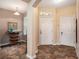 Bright and spacious entryway with tile flooring and access to other rooms at 2135 Park Crescent Dr, Land O Lakes, FL 34639