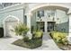 Well-maintained townhome with a private entry and lush landscaping at 2135 Park Crescent Dr, Land O Lakes, FL 34639