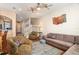 Relaxing living room with ample seating, hardwood floors, and natural light at 2135 Park Crescent Dr, Land O Lakes, FL 34639