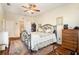 Main bedroom with large windows and en-suite bathroom at 2135 Park Crescent Dr, Land O Lakes, FL 34639