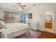Main bedroom with large windows and en-suite bathroom at 2135 Park Crescent Dr, Land O Lakes, FL 34639