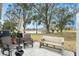 Cozy patio with seating area overlooking a pond at 2135 Park Crescent Dr, Land O Lakes, FL 34639