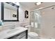 Bathroom features a vanity, toilet and shower at 2589 Redwood Cir, Clearwater, FL 33763