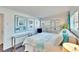 Main bedroom with a TV and coastal decor at 2589 Redwood Cir, Clearwater, FL 33763