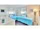 Guest bedroom with twin beds and beach decor at 2589 Redwood Cir, Clearwater, FL 33763