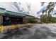 Greenbriar Club building exterior, featuring a parking lot and entrance at 2589 Redwood Cir, Clearwater, FL 33763