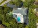 Arial view of community pool with surrounding lounge chairs and patio area at 2589 Redwood Cir, Clearwater, FL 33763