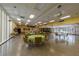 Bright community room featuring multiple tables and chairs at 2589 Redwood Cir, Clearwater, FL 33763