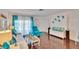 Bright living room with hardwood floors and coastal decor at 2589 Redwood Cir, Clearwater, FL 33763