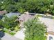 Aerial view of house and neighborhood, tree covered area at 2715 Durant Trails Blvd, Dover, FL 33527