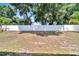 Large backyard with a white privacy fence at 2715 Durant Trails Blvd, Dover, FL 33527