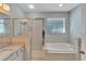 Bathroom boasts a large garden tub and separate shower at 2715 Durant Trails Blvd, Dover, FL 33527