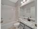 Bathroom with tub, toilet and granite countertop vanity at 2715 Durant Trails Blvd, Dover, FL 33527
