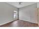 Bedroom with wood floors and neutral wall colors at 2715 Durant Trails Blvd, Dover, FL 33527