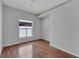 Bright bedroom with wood flooring and large window at 2715 Durant Trails Blvd, Dover, FL 33527