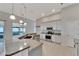 Modern kitchen with granite countertops and stainless steel appliances at 2715 Durant Trails Blvd, Dover, FL 33527