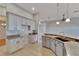Modern kitchen with granite countertops and ample cabinet space at 2715 Durant Trails Blvd, Dover, FL 33527