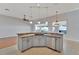 Island kitchen with granite countertops and stainless steel appliances at 2715 Durant Trails Blvd, Dover, FL 33527
