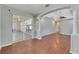 Bright living room with hardwood floors and access to a covered patio at 2715 Durant Trails Blvd, Dover, FL 33527