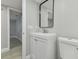 Bathroom with a vanity and toilet at 3020 Deleuil Ave, Tampa, FL 33610