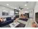 Open living room with fireplace and modern decor at 3020 Deleuil Ave, Tampa, FL 33610
