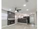 Modern living room featuring a fireplace and open layout at 3020 Deleuil Ave, Tampa, FL 33610