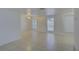 Bright living room featuring tile floors, recessed lighting, and two windows at 3205 Moog Rd, Holiday, FL 34691