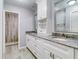 Double vanity bathroom with granite countertop at 40 Aster Pl, Oldsmar, FL 34677