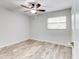 Bedroom with tile floors and window blinds at 40 Aster Pl, Oldsmar, FL 34677