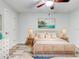 Bedroom with coastal decor and a wicker bed frame at 40 Aster Pl, Oldsmar, FL 34677