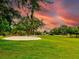 Golf course with sand trap at sunset at 40 Aster Pl, Oldsmar, FL 34677
