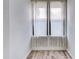 Bright sunroom with white curtains and tile floor at 40 Aster Pl, Oldsmar, FL 34677