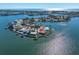 Aerial view of waterfront property on a peninsula at 495 Bath Club N Blvd, North Redington Beach, FL 33708